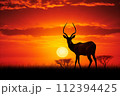 AI-generated content. Tranquil antelope grazing in african savannah at sunset, wildlife safari in warm golden light AI-generated content. Tranquil antelope grazing in african savannah at sunset, wildlife safari in warm golden light 112394425