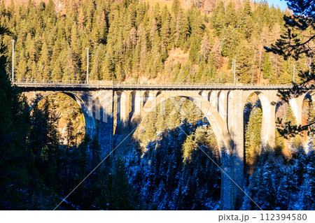 View of Wiesen Viaduct, Rhaetian railway, Graubunden in Switzerland at winter 112394580