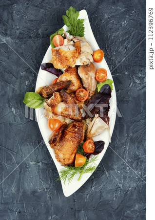 Grilled barbecue chicken pieces. Grilled barbecue chicken pieces. 112396769
