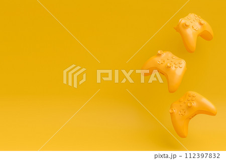 Set of flying gamer joysticks or gamepads on monochrome background 112397832