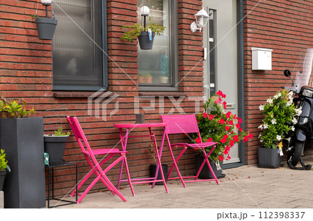 Pink Bistro Set on Urban Patio Pink Bistro Set on Urban Patio 112398337