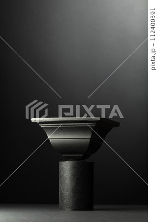 Black podium on a black background. Black podium on a black background. 112400391