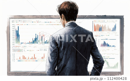 モニターに表示された株価チャートと注文画面を見つめる男性トレーダーの後ろ姿。