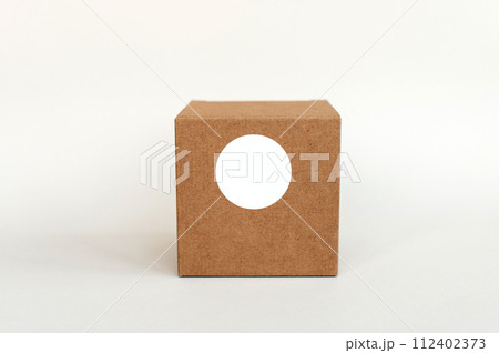 Round sticker mockup on gift box, tech box and blank sticker, adhesive label 112402373