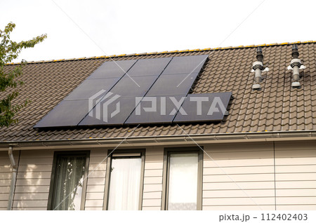 Solar Panels Installed on House Roof Solar Panels Installed on House Roof 112402403