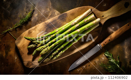 Green Asparagus on a Cutting Board with Knife - Generative Ai 112406902
