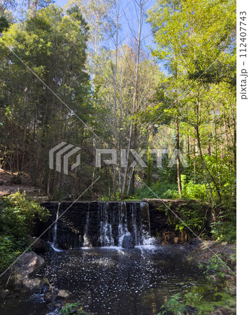Waterfall in the park of the Estanislau fountain 112407743