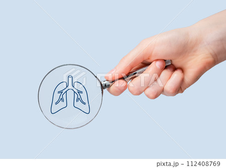 Lungs health checkup, study through magnifying glass 112408769
