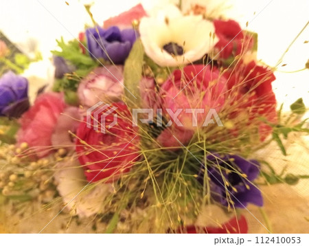 bouquet of colorful flowers, a floral composition arranged in a creative way. 112410053