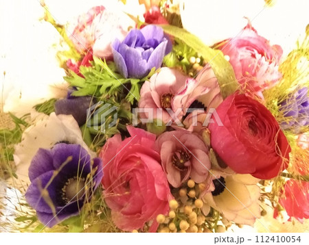 bouquet of colorful flowers, a floral composition arranged in a creative way. 112410054