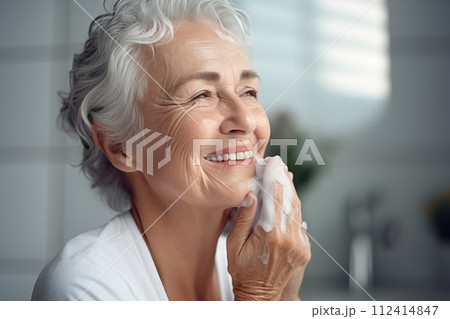 AI-generated content. portrait of a caucasian elderly woman washing face at home 112414847
