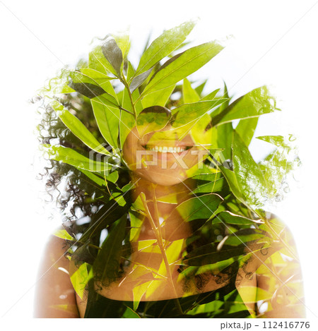 A double exposure portrait of a young smiling woman merged with leaves A double exposure portrait of a young smiling woman merged with leaves 112416776