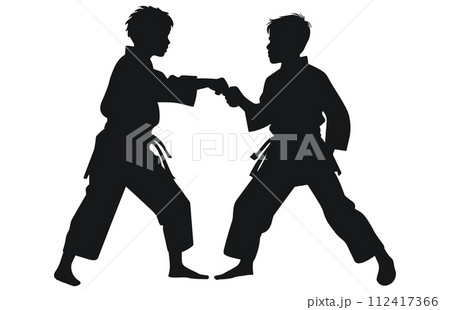 Two young boys doing karate silhouette, Two karate young boys fighters in a match, 112417366