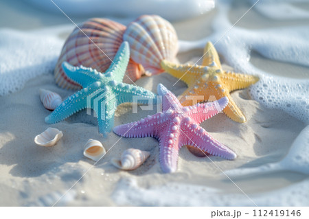 Colorful starfish is scattered across the sandy beach, in the style of minimalist backgrounds. Summer concept 112419146