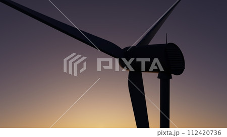 3d illustration A wind turbine is silhouetted against a beautiful sunset 112420736