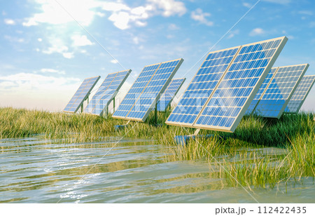 Solar panels on green grass field. Sustainable energy concept. 3d rendering. 112422435