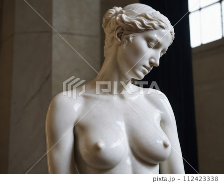 Sculpture of a naked maiden. Sculpture of a naked maiden. 112423338