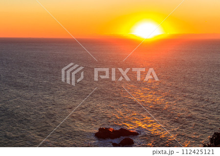View of the Atlantic Ocean from Cabo da Roca at sunset. Cabo da Roca or Cape Roca is westernmost cape of mainland Portugal, continental Europe and the Eurasian land mass 112425121