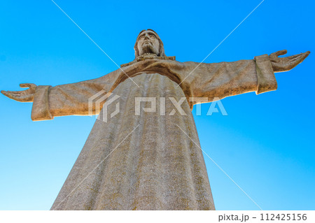 The Sanctuary of Christ the King (Cristo Rei) overlooking the city of Lisbon situated in Almada, in Portugal The Sanctuary of Christ the King (Cristo Rei) overlooking the city of Lisbon situated in Almada, in Portugal 112425156