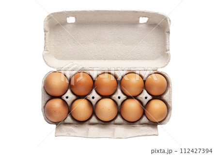 Ten brown eggs in a carton package isolated in white background. File contains clipping path. Ten brown eggs in a carton package isolated in white background. File contains clipping path. 112427394
