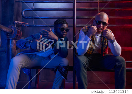 Group of modern cool hip-hop dancers at garage studio 112431514