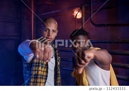 Young junior gang members giving fist to each other 112431531