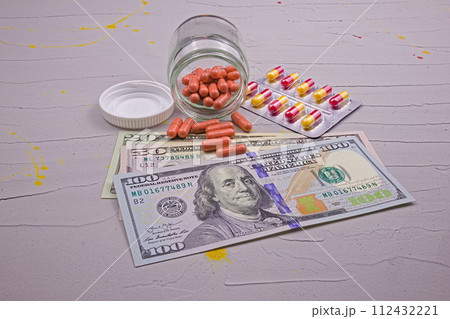 Medicines have become more expensive. Grey background. Medicines have become more expensive. Grey background. 112432221
