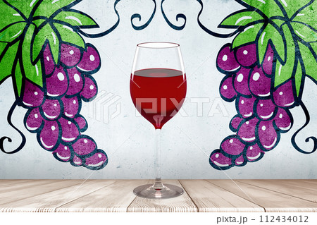 Glass of red wine and illustrated grape vines Glass of red wine and illustrated grape vines 112434012