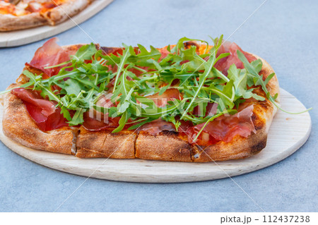 Tasty pinsa on a table 112437238