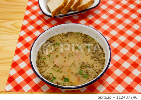 Traditional Polish soup Zurek on a table Traditional Polish soup Zurek on a table 112437246