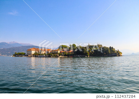 View of Isola Bella (one of the Borromean Islands of Lago Maggiore) from Stresa town, Italy 112437284