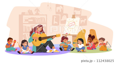 Children In A Music Class Sit On The Floor, Joyfully Exploring Various Instruments, Like Drum, Xylophone, Maracas 112438025
