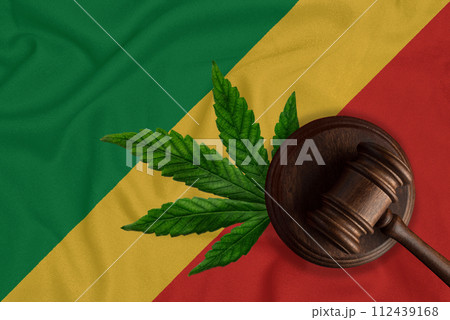 Cannabis leaf and judge gavel on the Congo flag background 112439168