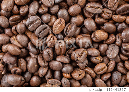 Fresh roasted brown coffee beans background Fresh roasted brown coffee beans background 112441227