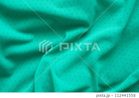 Green sports clothing fabric football shirt jersey texture background Green sports clothing fabric football shirt jersey texture background 112441558