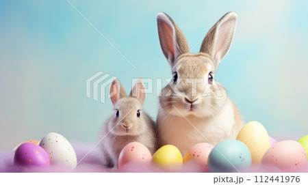 AI-generated content. Two cute rabbits with colorful Easter eggs on blue background 112441976