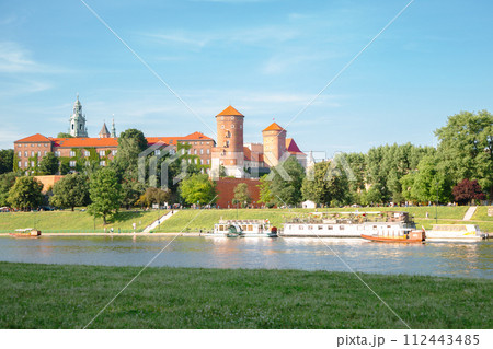 Wawel Castle and Vistula river park in Krakow, Poland Wawel Castle and Vistula river park in Krakow, Poland 112443485