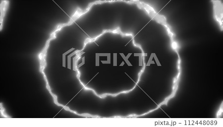 Abstract background looped circles a tunnel of flying black and white rings of energy plasma with a glow effect shiny festive bright beautiful futuristic hi-tech Abstract background looped circles a tunnel of flying black and white rings of energy plasma with a glow effect shiny festive bright beautiful futuristic hi-tech 112448089