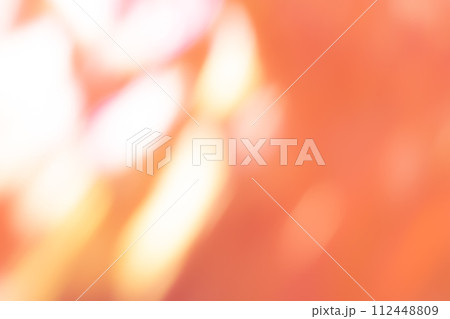 オレンジカラー系動きのあるイメージ　背景素材 112448809