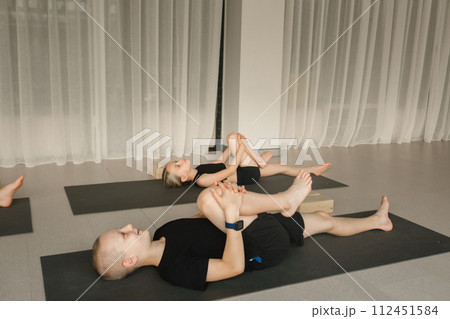 Children do Yoga in the fitness room. Children's gymnastics. 112451584