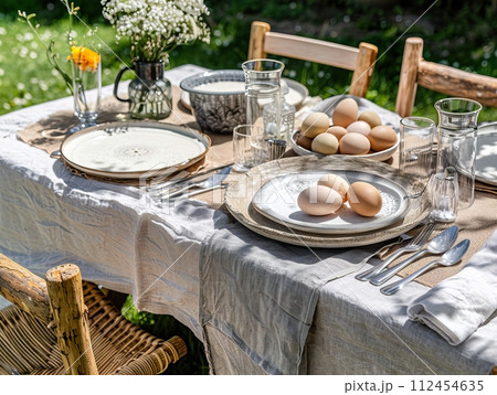 AI-generated content. Easter table setting, springtime party table decor with flowers, eggs and beautiful details, spring festive home party decorations 112454635