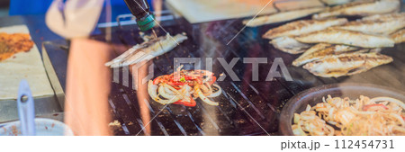 Balik ekmek - fish in a bread, traditional Turkish fast food. Istanbul, Turkey BANNER, LONG FORMAT Balik ekmek - fish in a bread, traditional Turkish fast food. Istanbul, Turkey BANNER, LONG FORMAT 112454731