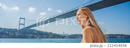 Happy woman enjoying the sea from ferry boat crossing Bosphorus in Istanbul. Summer trip to Istanbul BANNER, LONG FORMAT 112454936