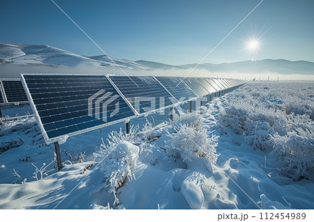 AI-generated content. Solar panels covered with snow, contrast between the icy landscape and the dark solar panels, showcasing the resilience of renewable energy technology in cold climates 112454989