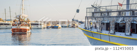 Old town Kaleici in Antalya. Panoramic view of Antalya Old Town port, Taurus mountains and Mediterrranean Sea, Turkey BANNER, LONG FORMAT Old town Kaleici in Antalya. Panoramic view of Antalya Old Town port, Taurus mountains and Mediterrranean Sea, Turkey BANNER, LONG FORMAT 112455003