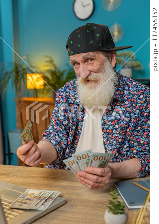 Senior man freelancer counting cash insufficient amount of money financial crisis bankruptcy poverty Senior man freelancer counting cash insufficient amount of money financial crisis bankruptcy poverty 112455152