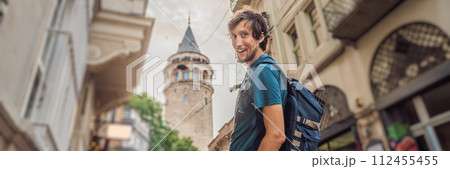 Portrait of man tourist with view of Galata tower in Beyoglu, Istanbul, Turkey. Turkiye BANNER, LONG FORMAT Portrait of man tourist with view of Galata tower in Beyoglu, Istanbul, Turkey. Turkiye BANNER, LONG FORMAT 112455455