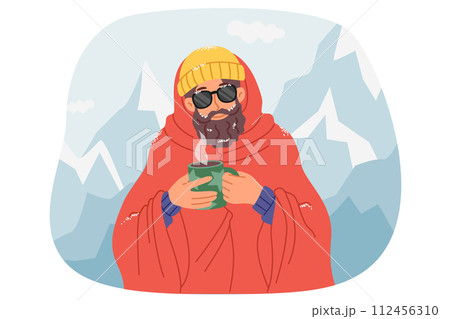 Man traveler drinks hot coffee, standing among snow-capped mountains after climbing to top Man traveler drinks hot coffee, standing among snow-capped mountains after climbing to top 112456310