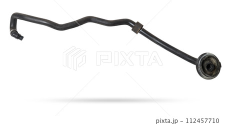 Black rubber hose of the car engine cooling system on a white isolated background in a photo studio for replacement during repair or for a catalog of spare parts for sale on auto disassembly. Black rubber hose of the car engine cooling system on a white isolated background in a photo studio for replacement during repair or for a catalog of spare parts for sale on auto disassembly. 112457710
