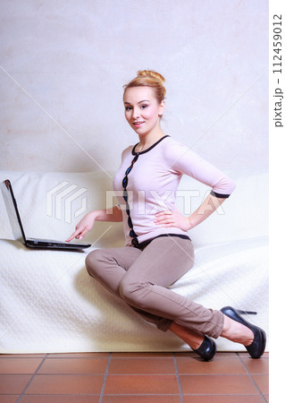 Modern businesswoman working on laptop computer Modern businesswoman working on laptop computer 112459012